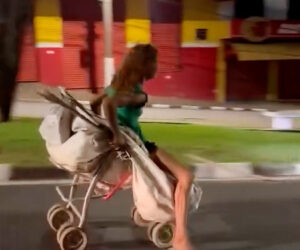 Woman Riding Baby Pushchair’s Drag Race With Car